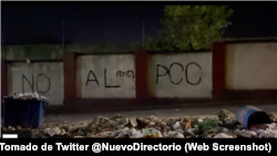 Un cartel del grupo opositor, El Nuevo Directorio, END.