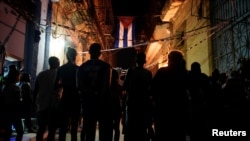 Cubanos en una reunión del CDR en septiembre de 2019. REUTERS/Alexandre Meneghini