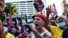 Gritos por la libertad de Cuba, Nicaragua y Venezuela el 31 de julio en Miami. (Chandan Khanna/AFP).
