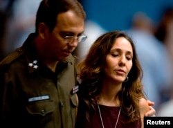 Mariela Castro y su hermano el coronel Alejandro Castro.REUTERS/Adalberto Roque/Pool