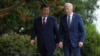 El presidente de EEUU, Joe Biden, y el presidente de China, Xi Jinping, caminan en los jardines de Filoli Estate, en Woodside, California, el miércoles 15 de noviembre de 2023. (Doug Mills/The New York Times via AP, Pool).