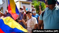 Simpatizantes del dirigente opositor Freddy Superlano participan en una manifestación en Barinas, Venezuela, el 4 de diciembre de 2021. Foto: AP/Ariana Cubillos.
